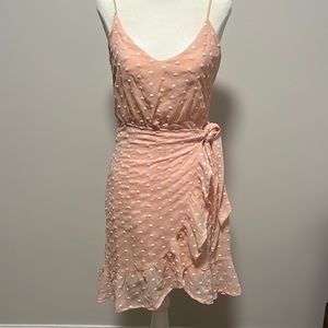 Baby pink with white polka dots and frills wrap dress